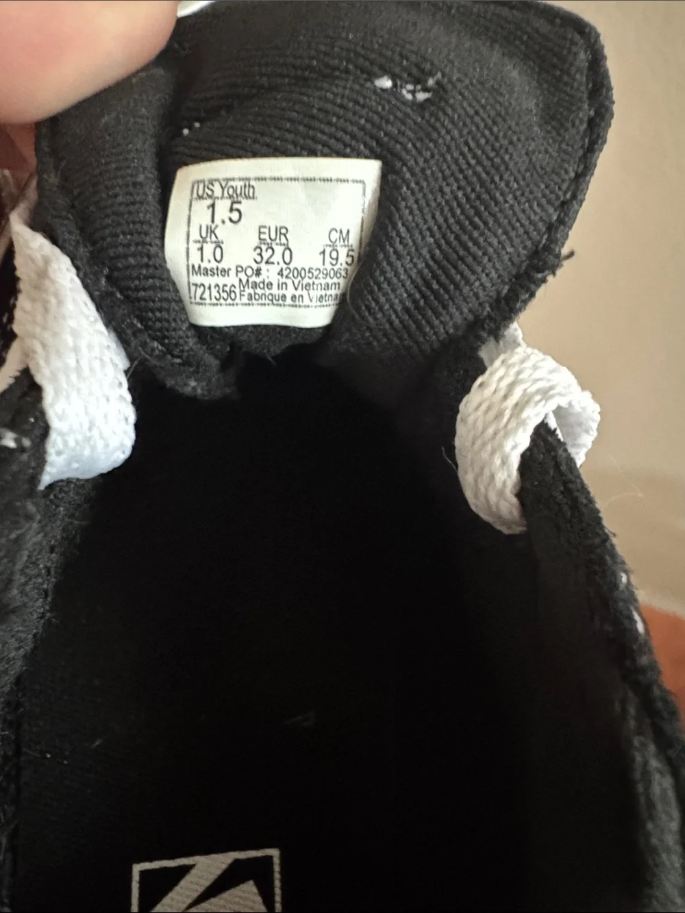 Vans Kids Black and White Classic Low Top Sneakers